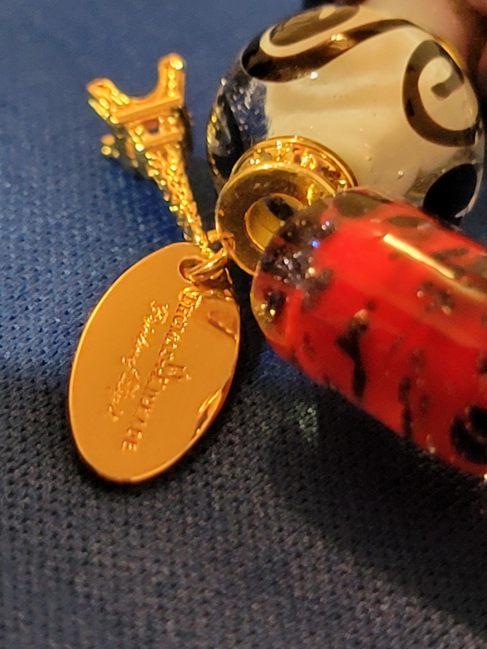 Gold-Tone Red and White Bead Charm Pendant Bracelet